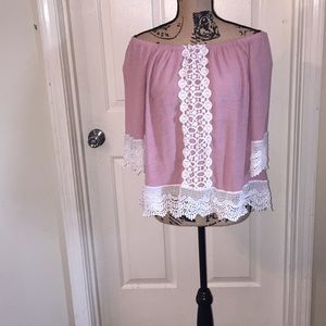 Pink laced top .